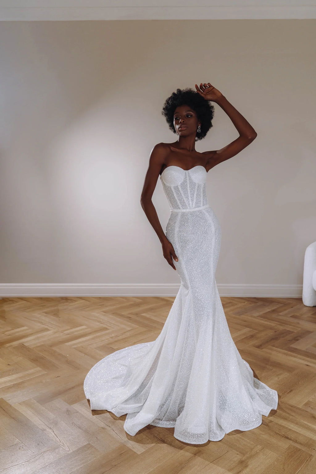 Form fitting wedding dress with corset bodice and zipper back. Can be worn together with a full tulle skirt
