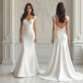 Elegant mermaid satin wedding dress with sweetheart neckline, lace cap sleeves, and deep V-back