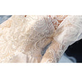 Ball gown gorgeous lace pearls crystal appliques three quarter sleeve wedding dress close-up