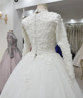 3D flowers pearls Muslim wedding dress Dubai high neck long sleeves bridal gown side view
