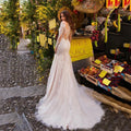 Long sleeve V-neck luxury lace mermaid detachable train wedding dress side view