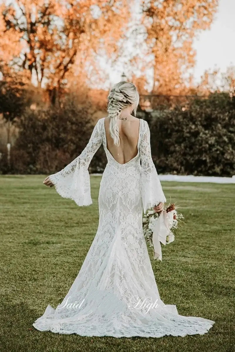 Rustic boho lace vintage mermaid beach flare sleeves open back bridal gown detail