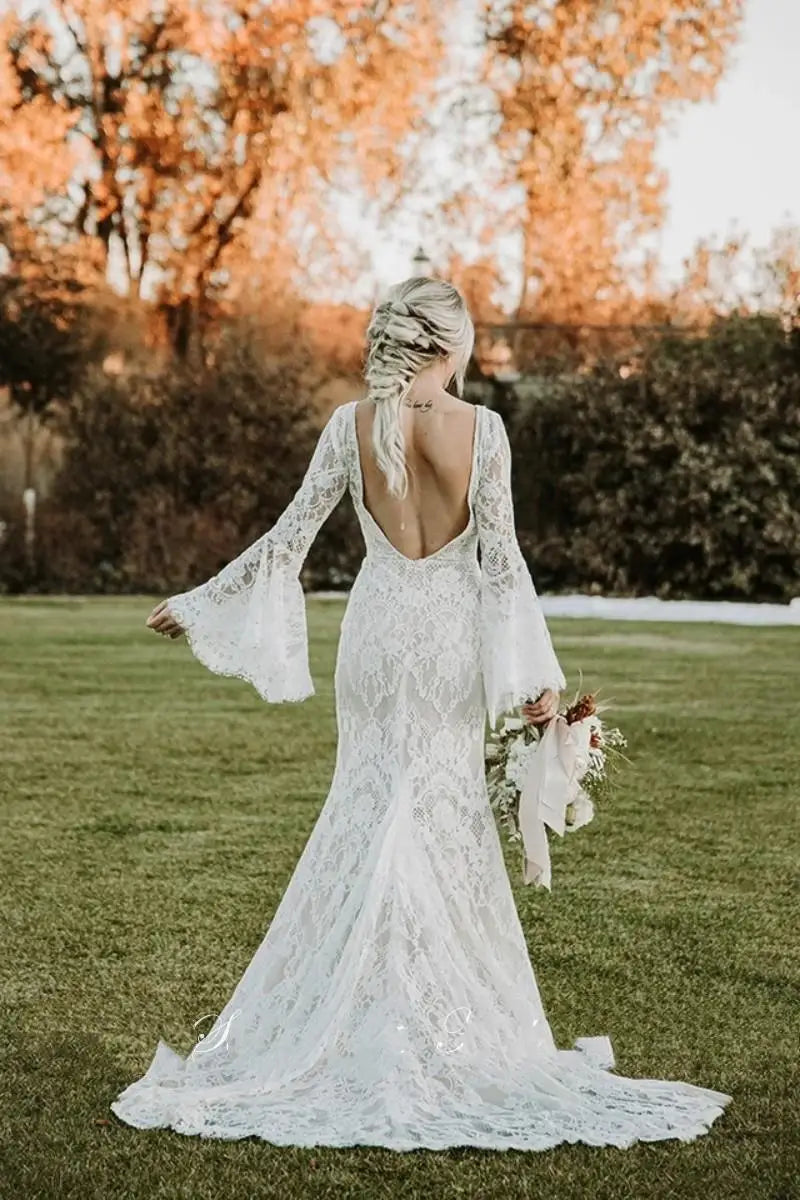 Flare sleeves lace vintage mermaid beach open back rustic boho bridal gown side view