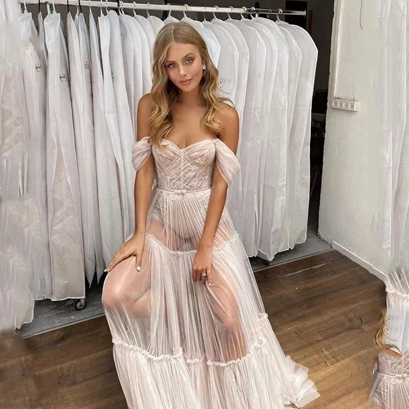 Off-shoulder lace boho beach sleeveless illusion elegant ivory wedding dress side view