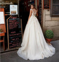 Short sleeves lace A-line tulle princess ruffles African appliqued bridal gown side view