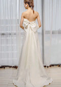 Trumpet mermaid strapless elegant satin big bow bridal gown detail