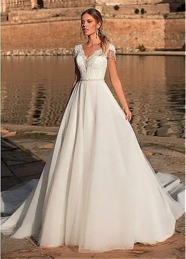 Graceful V-neck A-line tulle short sleeve illusion back appliques bridal gown front view