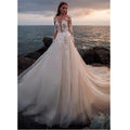 Illusion long sleeve lace train appliques ivory bride wedding dress front view