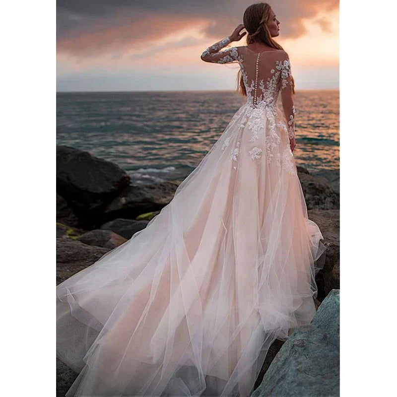Lace long sleeve illusion train appliques ivory wedding dress back view