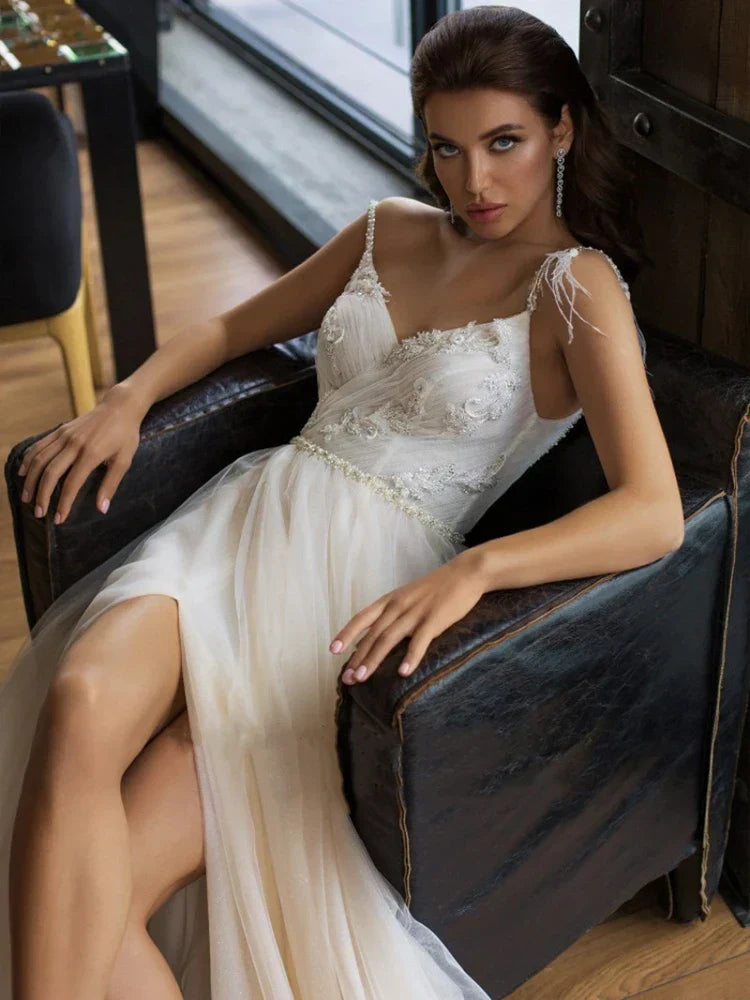 V-neck spaghetti straps beach backless tulle A-line bridal gown side view