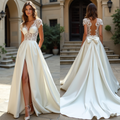  A-line wedding dress with lace bodice, satin skirt, deep V-neckline, and high slit – perfect for the modern romantic bride