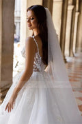 Spaghetti straps sleeveless fluffy A-line sexy princess lace white bridal gown side view