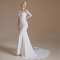 Long sleeve O-neck lace mermaid autumn elegant button back wedding dress side view