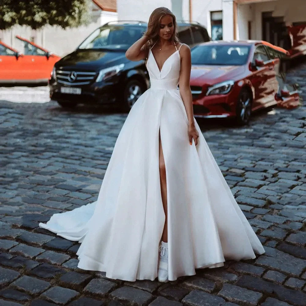 Classy long plus size V-neck sleeveless backless slit A-line sweep train bridal gown front view