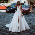 Classy long plus size V-neck sleeveless backless slit A-line sweep train bridal gown front view