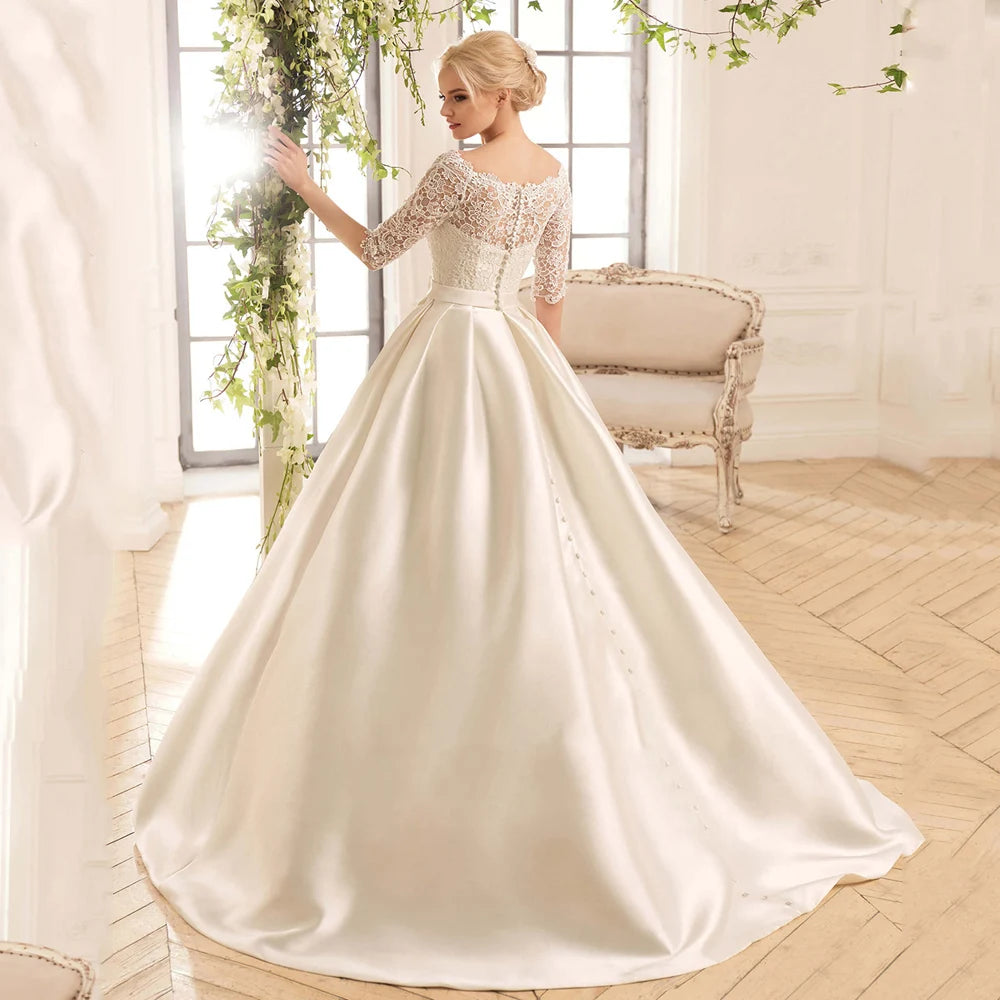 Boat neck half sleeve satin A-line wedding dress – front view – Snowy Bridal