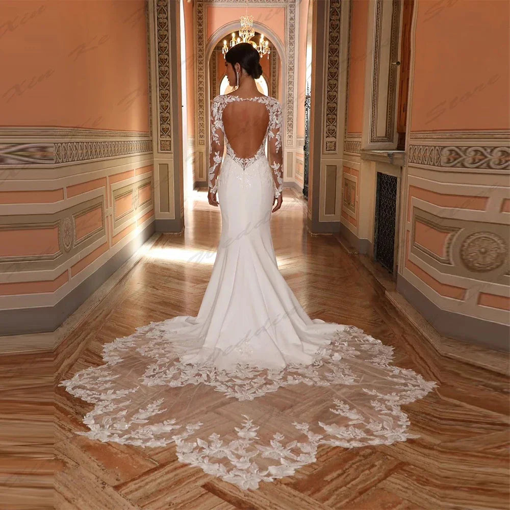 Gorgeous princess mermaid long sleeved lace formal beach party prom wedding dress back view