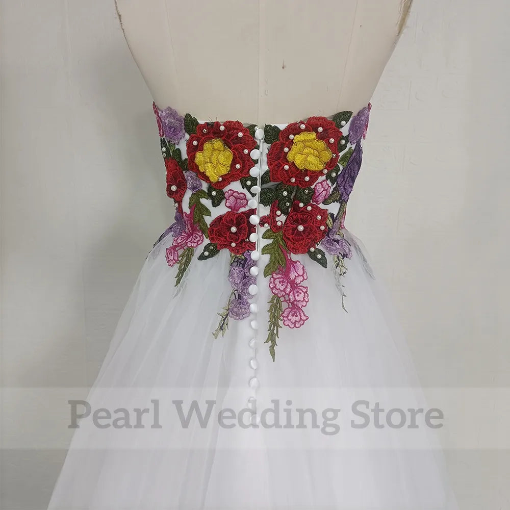 Backless sweep train tulle A-line strapless embroidery sleeveless floor length wedding dress back view