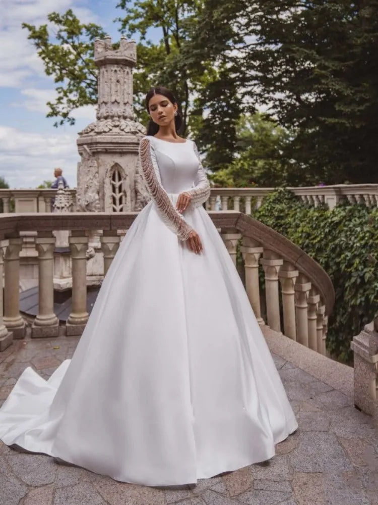 Custom made satin vintage A-line boat neck elegant full sleeve button beading wedding dress close-up