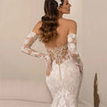 Sweetheart long sleeve mermaid luxury open back lace court train bridal gown side view