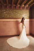 Sexy 2026 O-neck mermaid lace illusion buttons back appliques wedding dress bridal gown back view