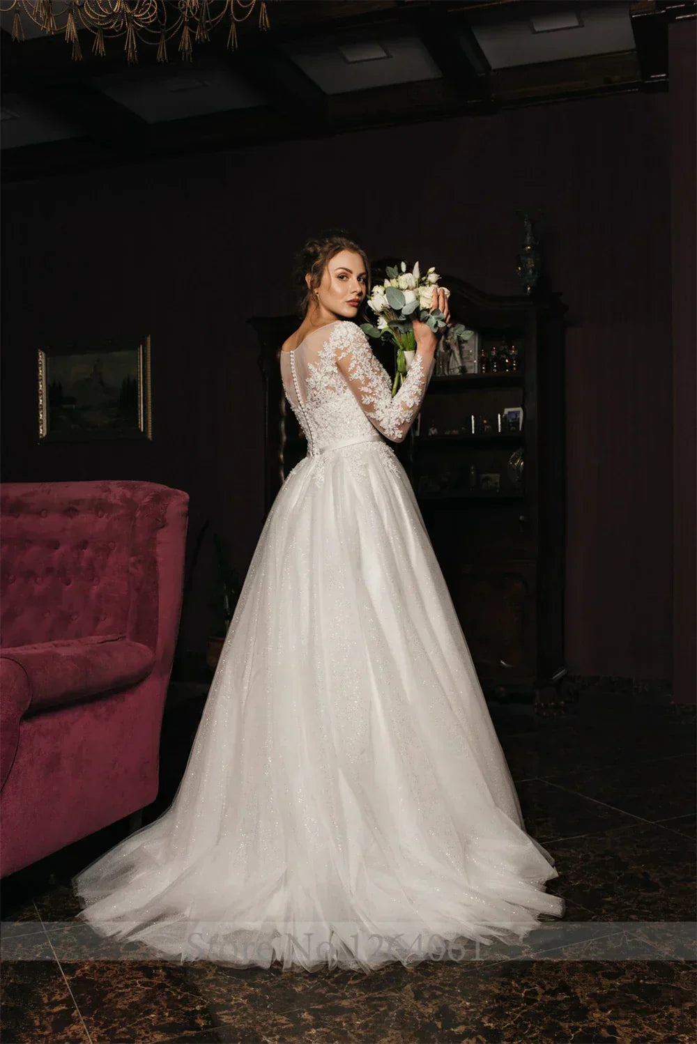 Long sleeve A-line round neck lace illusion button tulle skirt bridal party gown front view