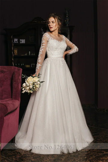 Long sleeve A-line round neck lace illusion button tulle skirt bridal party gown front view