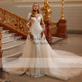 Mermaid O-neck beading full sleeve detachable train elegant bridal gown close-up
