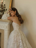 Strapless A-line lace wedding dress with puff sleeves – back view – Snowy Bridal