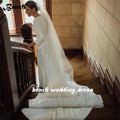 Sexy backless O-neck boho beach mermaid long sleeves sweep train wedding dress bridal gown back view
