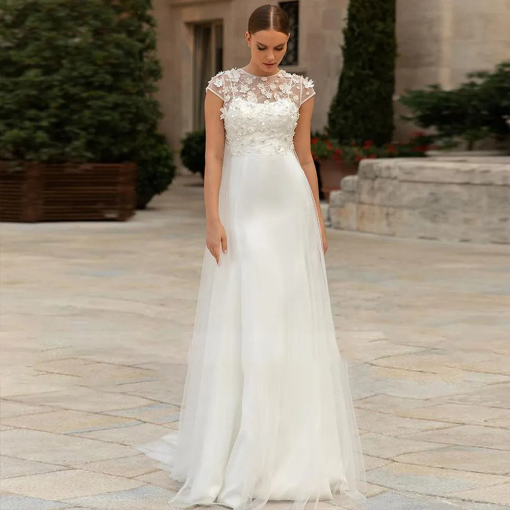 Cap sleeve O-neck sweetheart 3D flowers satin tulle overskirt cut-out back bride bridal gown side view