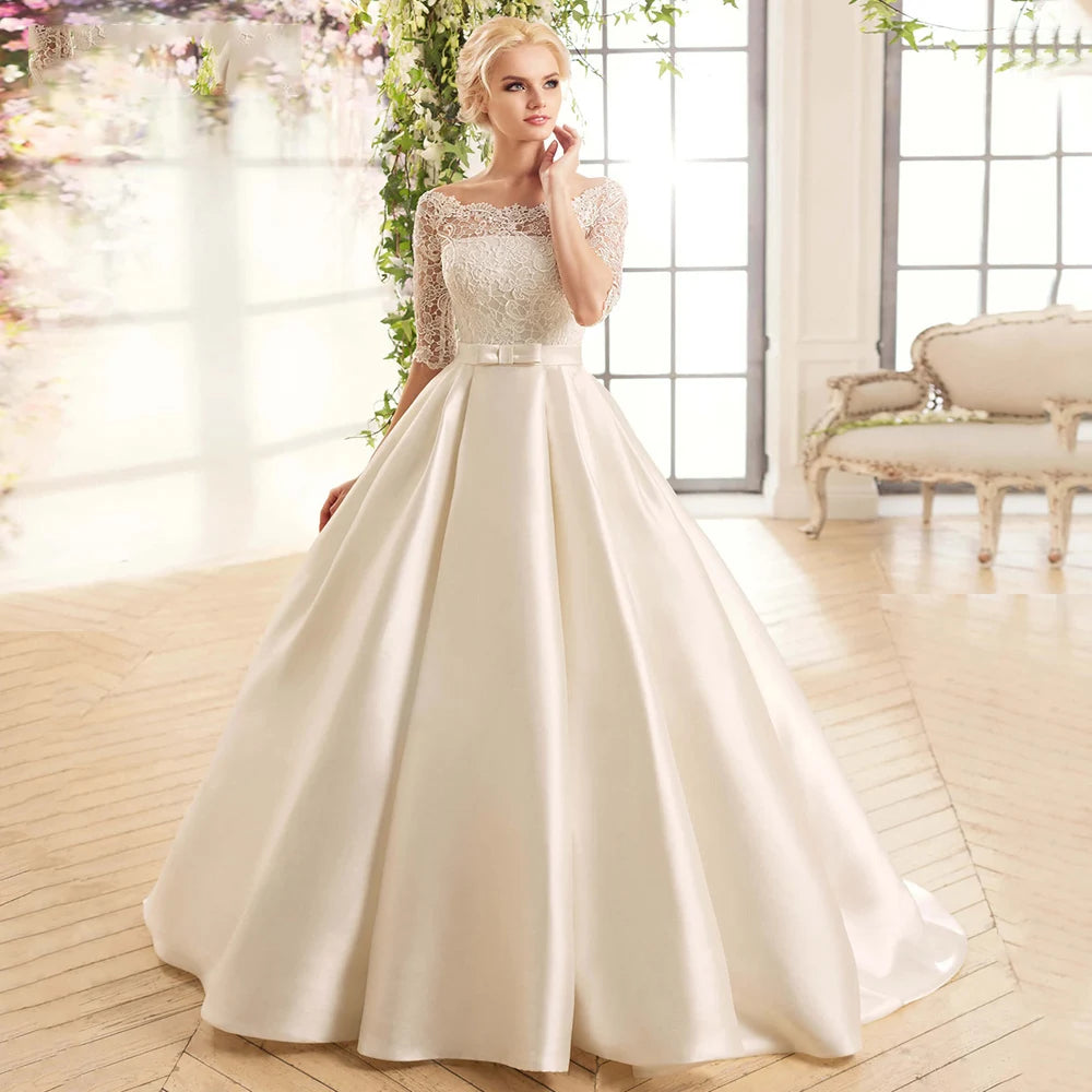 Boat neck half sleeve satin A-line wedding dress – front view – Snowy Bridal