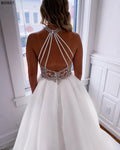 Boho A-line high neck white crystals pockets organza simple wedding dress bridal gown side view