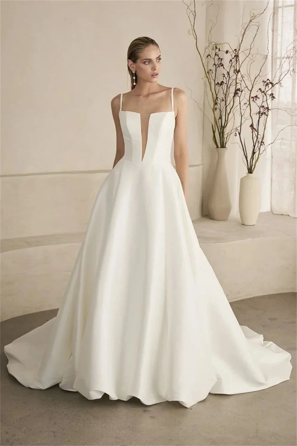 Simple A-line wedding dress 2026 spaghetti strap V-neck sleeveless soft satin princess bridal gown