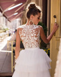 Scoop short A-line sexy princess tea length tiered tulle beach bridal gown side view