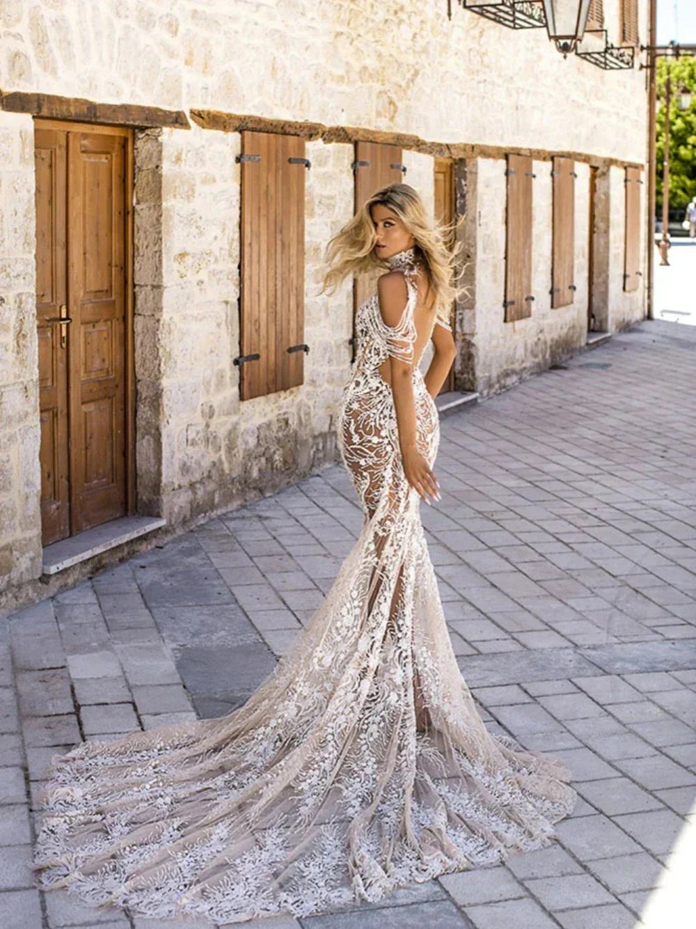 Halter illusion appliques pearls backless floor-length wedding dress front view