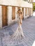 Halter illusion appliques pearls backless floor-length wedding dress front view