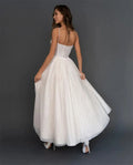 Spaghetti straps bling sequins tea length elegant cocktail evening dress front view