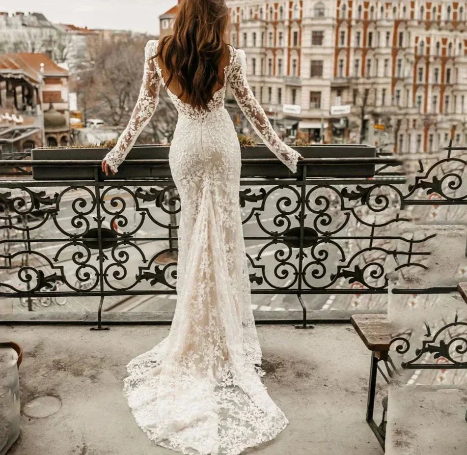 Classy mermaid lace appliques off-shoulder long sleeve backless bridal gown front view