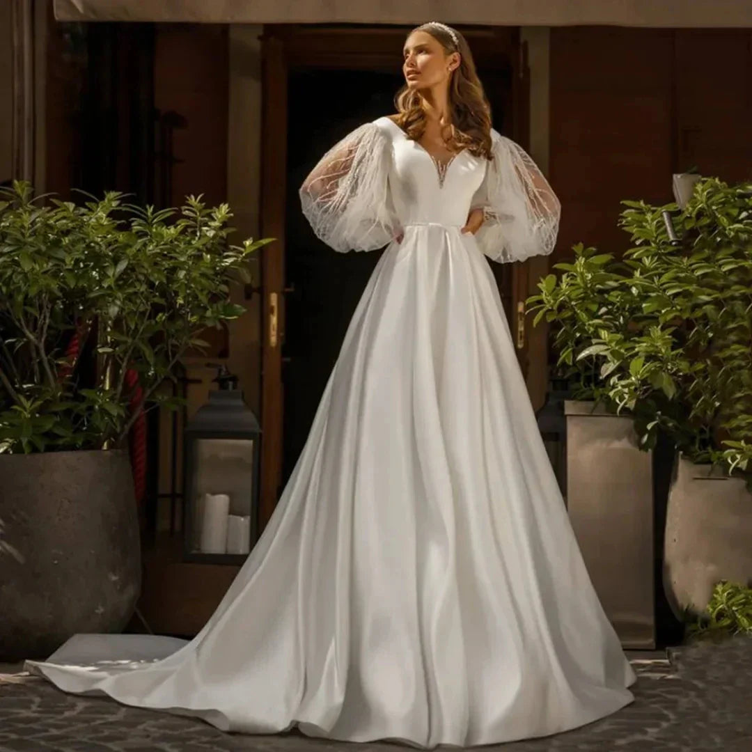 Romantic satin wedding dress 2026 puffed sleeves V-neck beading lace A-line bridal gown