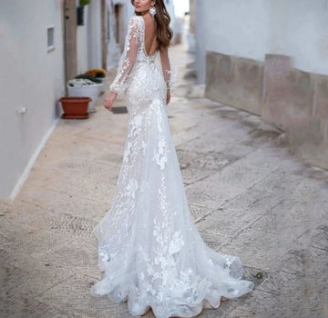 Luxury backless tulle mermaid V-neck long sleeve lace appliques white bridal gown front view