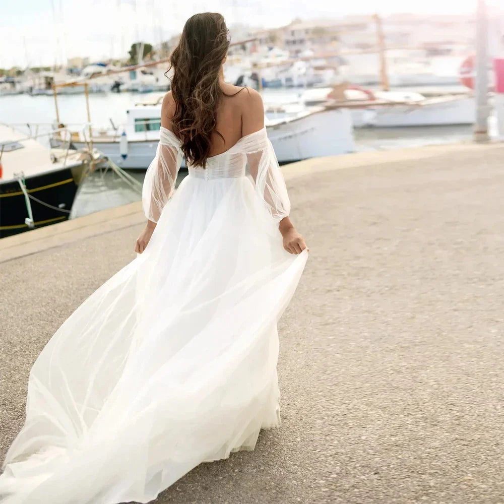 Elegant wedding dress 2026 strapless puff sleeves open back floor length tulle A-line beach bridal gown