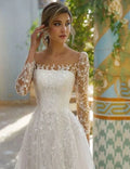 Exquisite O-neck A-line lace tulle long sleeve embroidery button pleat wedding dress back view