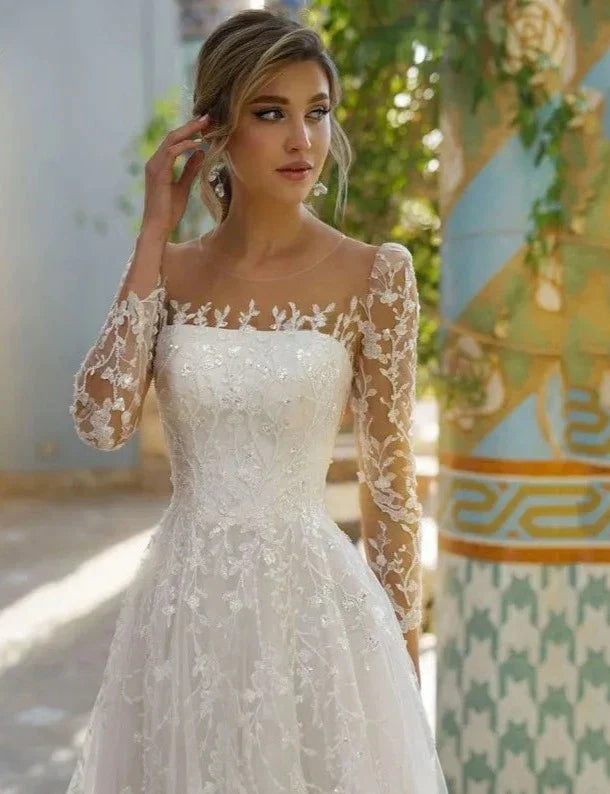 Exquisite O-neck A-line lace tulle long sleeve embroidery button pleat wedding dress back view