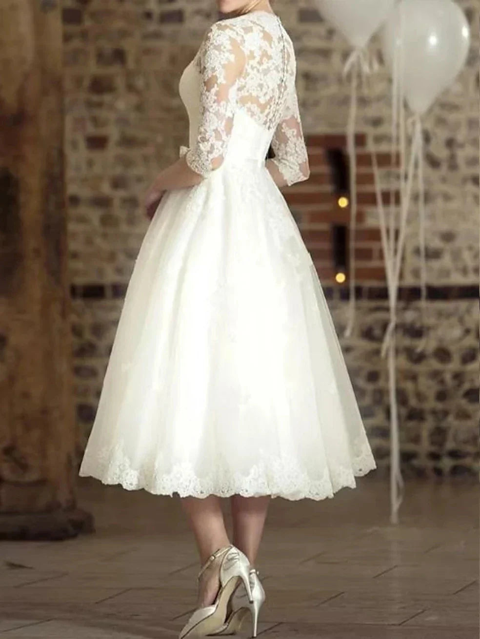Vintage A-line wedding dress 1940s style V-neck tea-length lace covered button bridal gown