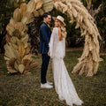 Boho mermaid flared sleeve lace V-back sexy beach bride gown white bohemian front view