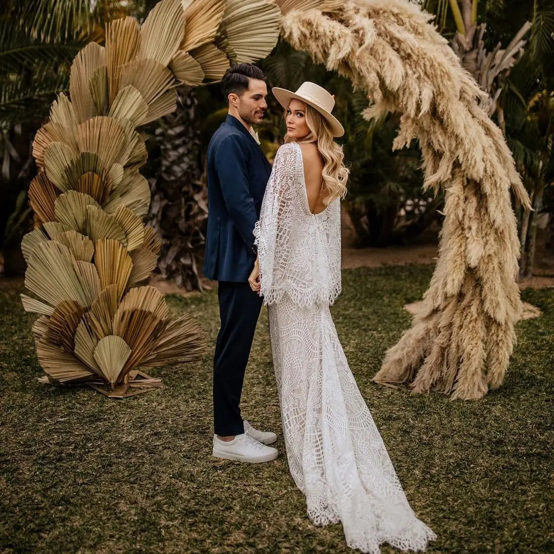 Boho mermaid flared sleeve lace V-back sexy beach bride gown white bohemian front view
