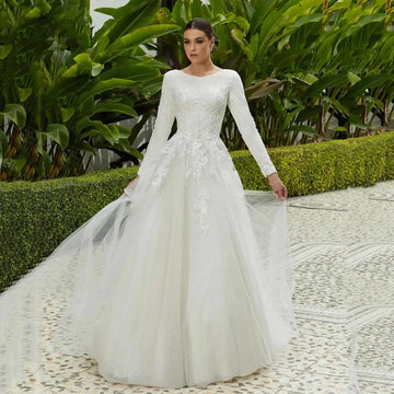 Flavinke Customized Tulle Wedding Dresses For Woman Boat Neck Long Sleeve Floral Lace Appliques Button Vestidos De Noiva 2026