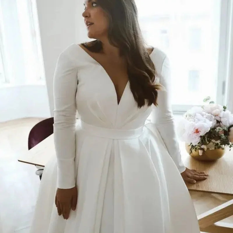 Long sleeve Wedding dress with Pockets on skirt Deep v-neckline Plus Size Modern Stain Princess Bridal Gowns Custom made