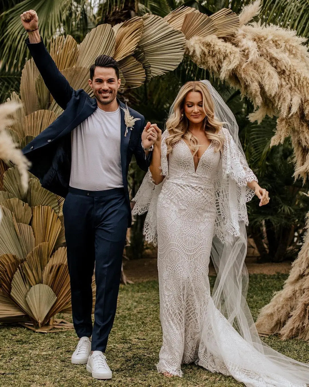 Lace V-back flared sleeve boho mermaid white beach bride gown back view